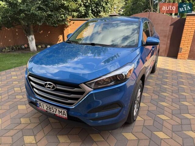 Синій Хендай Туксон, об'ємом двигуна 2 л та пробігом 92 тис. км за 17300 $, фото 2 на Automoto.ua