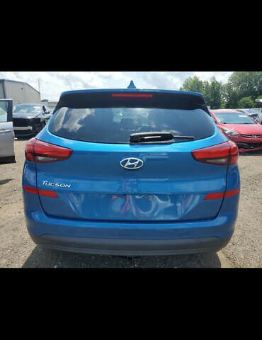 Синій Хендай Туксон, об'ємом двигуна 2 л та пробігом 81 тис. км за 11000 $, фото 5 на Automoto.ua