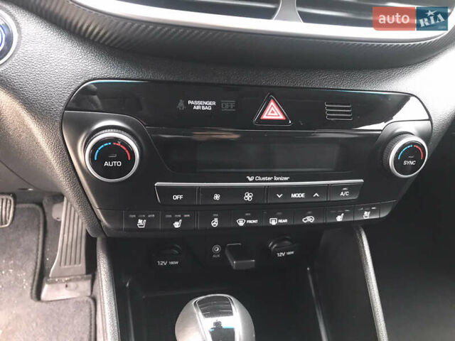 Синий Хендай Туксон, объемом двигателя 2 л и пробегом 145 тыс. км за 21600 $, фото 31 на Automoto.ua