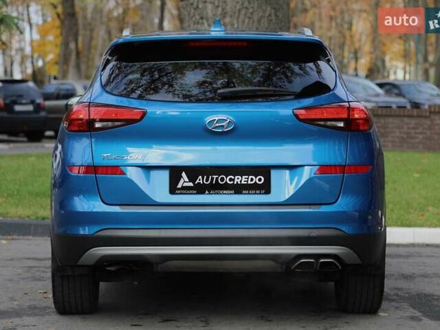 Синій Хендай Туксон, об'ємом двигуна 2.4 л та пробігом 109 тис. км за 17000 $, фото 4 на Automoto.ua