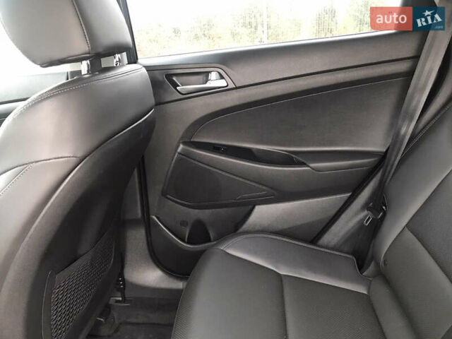 Синий Хендай Туксон, объемом двигателя 2 л и пробегом 145 тыс. км за 21600 $, фото 46 на Automoto.ua