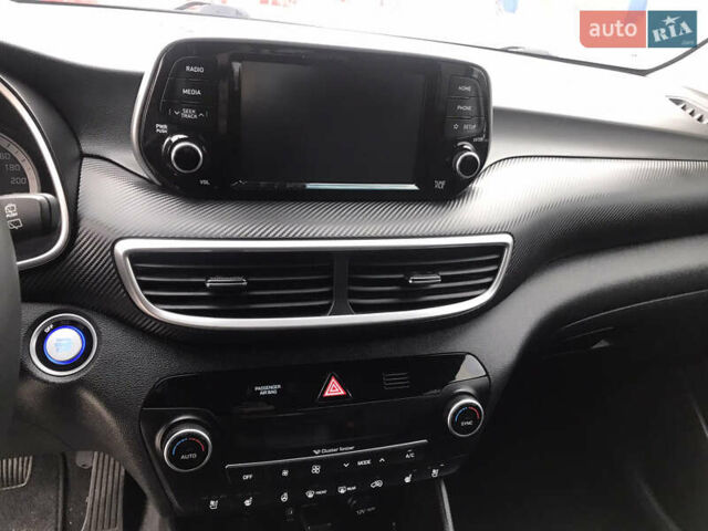 Синий Хендай Туксон, объемом двигателя 2 л и пробегом 145 тыс. км за 21600 $, фото 30 на Automoto.ua