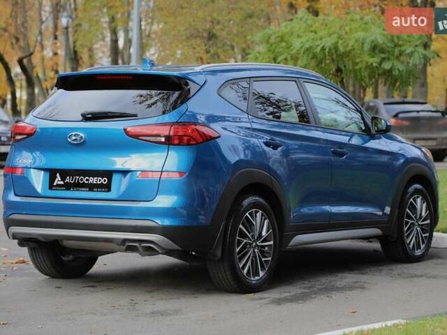 Синій Хендай Туксон, об'ємом двигуна 2.4 л та пробігом 109 тис. км за 17000 $, фото 3 на Automoto.ua