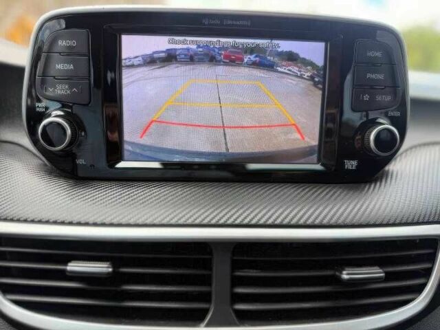 Синий Хендай Туксон, объемом двигателя 2 л и пробегом 99 тыс. км за 5500 $, фото 10 на Automoto.ua