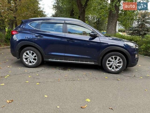 Синий Хендай Туксон, объемом двигателя 2 л и пробегом 48 тыс. км за 22790 $, фото 1 на Automoto.ua