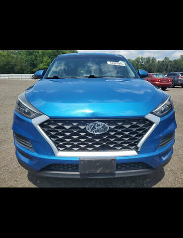 Синій Хендай Туксон, об'ємом двигуна 2 л та пробігом 81 тис. км за 11000 $, фото 4 на Automoto.ua