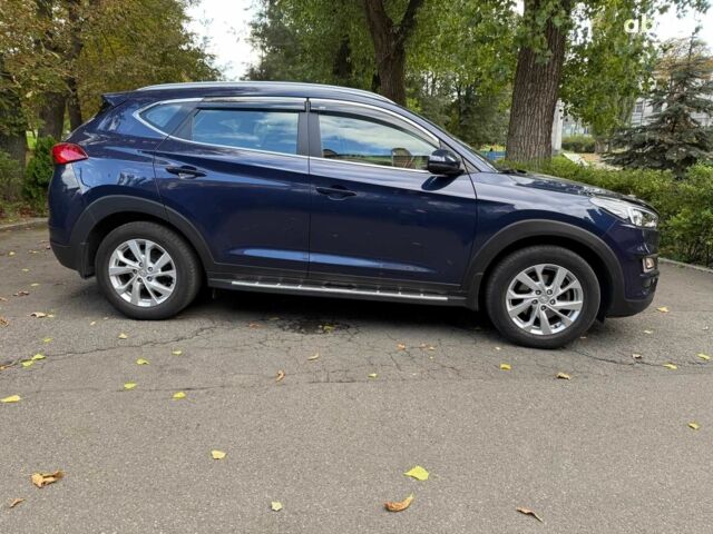 Синий Хендай Туксон, объемом двигателя 2 л и пробегом 48 тыс. км за 22740 $, фото 3 на Automoto.ua