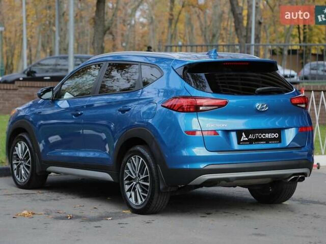 Синій Хендай Туксон, об'ємом двигуна 2.4 л та пробігом 109 тис. км за 17000 $, фото 5 на Automoto.ua