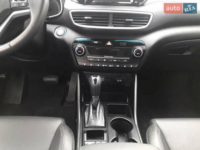 Синий Хендай Туксон, объемом двигателя 2 л и пробегом 145 тыс. км за 21600 $, фото 48 на Automoto.ua