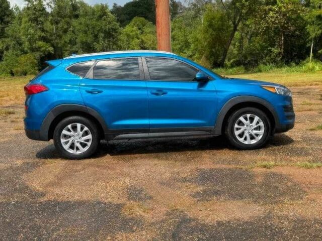 Синий Хендай Туксон, объемом двигателя 2 л и пробегом 99 тыс. км за 5500 $, фото 7 на Automoto.ua