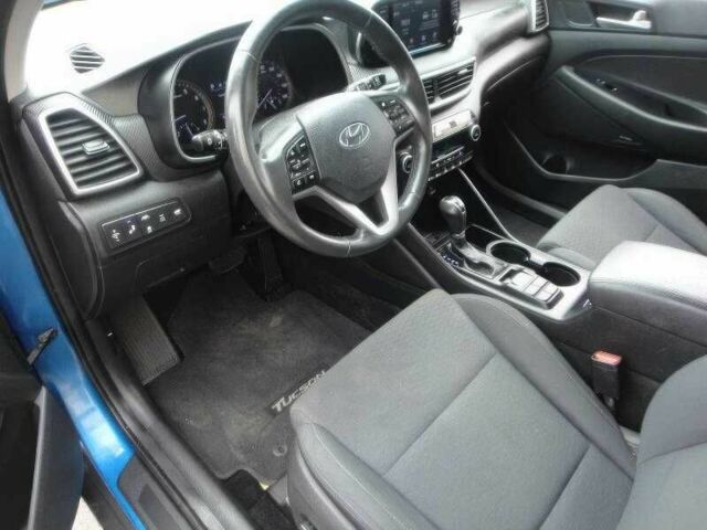 Синий Хендай Туксон, объемом двигателя 2.4 л и пробегом 55 тыс. км за 14000 $, фото 6 на Automoto.ua