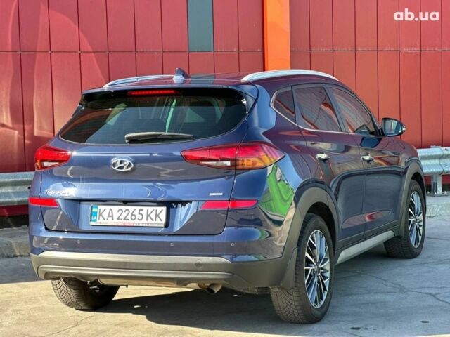 Синий Хендай Туксон, объемом двигателя 2 л и пробегом 111 тыс. км за 22500 $, фото 8 на Automoto.ua