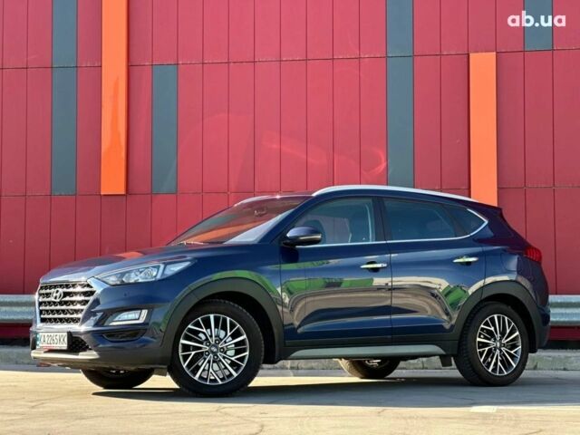 Синий Хендай Туксон, объемом двигателя 2 л и пробегом 111 тыс. км за 22500 $, фото 2 на Automoto.ua