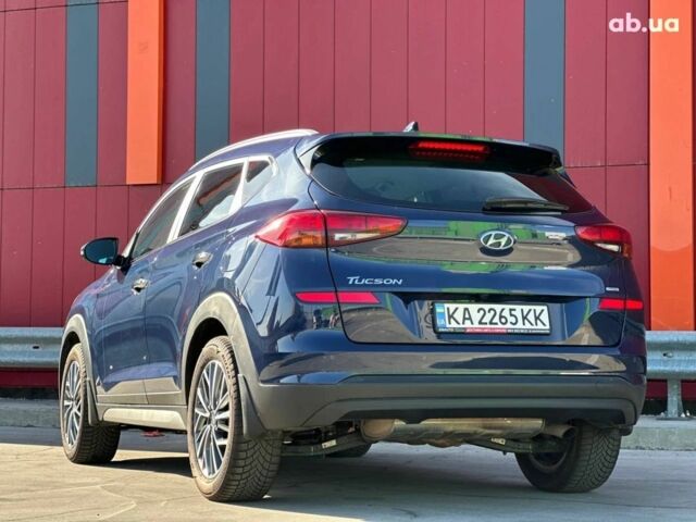 Синий Хендай Туксон, объемом двигателя 2 л и пробегом 111 тыс. км за 22500 $, фото 6 на Automoto.ua