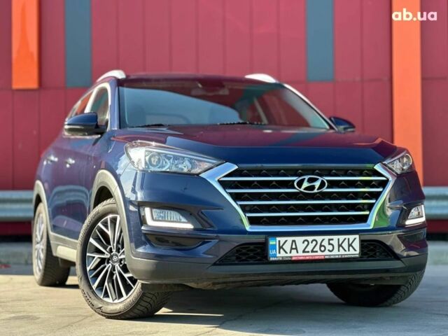 Синий Хендай Туксон, объемом двигателя 2 л и пробегом 111 тыс. км за 22500 $, фото 4 на Automoto.ua