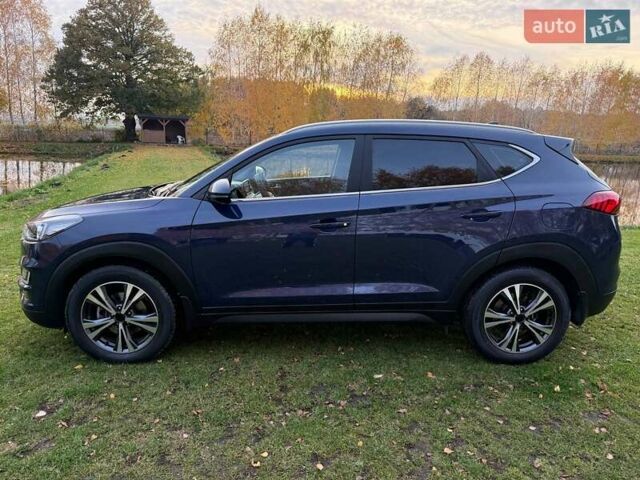 Синий Хендай Туксон, объемом двигателя 2 л и пробегом 43 тыс. км за 24000 $, фото 4 на Automoto.ua
