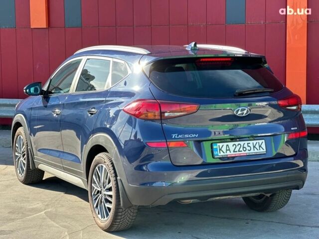 Синий Хендай Туксон, объемом двигателя 2 л и пробегом 111 тыс. км за 22500 $, фото 7 на Automoto.ua