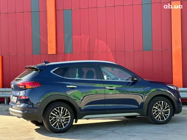 Синий Хендай Туксон, объемом двигателя 2 л и пробегом 111 тыс. км за 22500 $, фото 5 на Automoto.ua