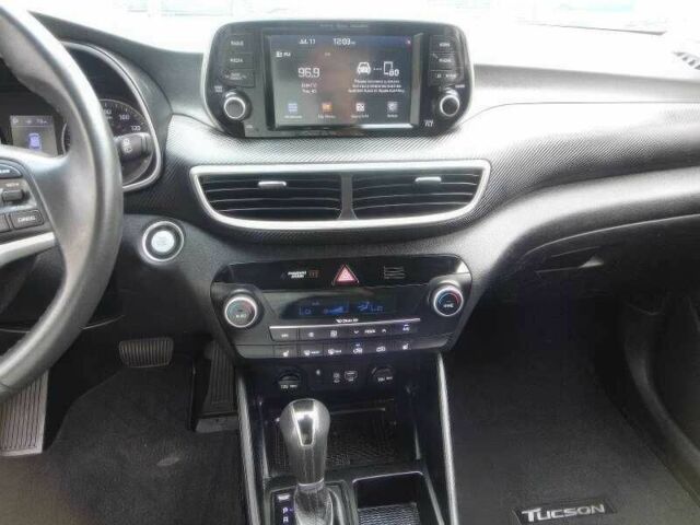 Синий Хендай Туксон, объемом двигателя 2.4 л и пробегом 55 тыс. км за 14000 $, фото 7 на Automoto.ua