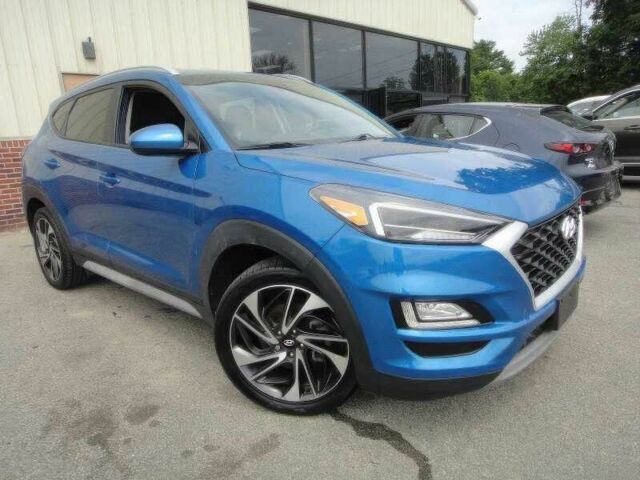 Синий Хендай Туксон, объемом двигателя 2.4 л и пробегом 55 тыс. км за 14000 $, фото 2 на Automoto.ua