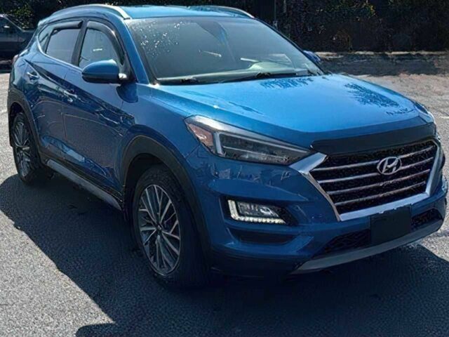 Синий Хендай Туксон, объемом двигателя 2.4 л и пробегом 35 тыс. км за 12300 $, фото 2 на Automoto.ua