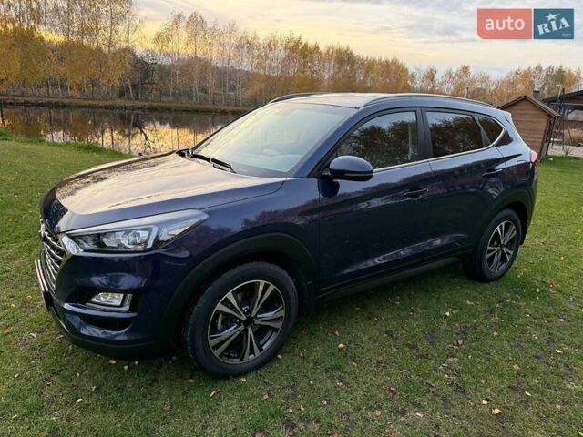 Синий Хендай Туксон, объемом двигателя 2 л и пробегом 43 тыс. км за 24000 $, фото 2 на Automoto.ua