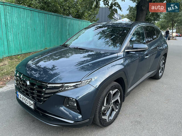 Синий Хендай Туксон, объемом двигателя 2 л и пробегом 77 тыс. км за 27900 $, фото 1 на Automoto.ua