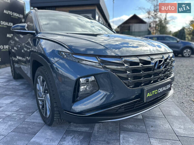 Синий Хендай Туксон, объемом двигателя 2 л и пробегом 50 тыс. км за 25400 $, фото 13 на Automoto.ua