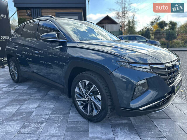 Синий Хендай Туксон, объемом двигателя 2 л и пробегом 50 тыс. км за 25400 $, фото 11 на Automoto.ua