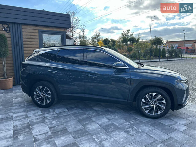 Синий Хендай Туксон, объемом двигателя 2 л и пробегом 50 тыс. км за 25400 $, фото 10 на Automoto.ua