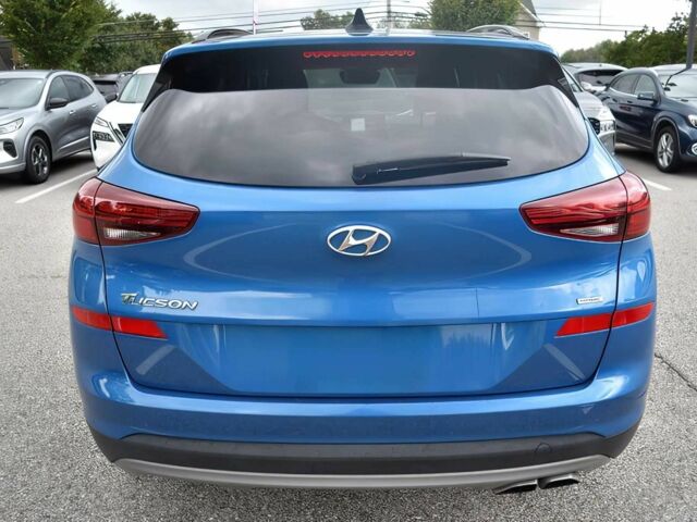 Синий Хендай Туксон, объемом двигателя 2.4 л и пробегом 23 тыс. км за 11000 $, фото 5 на Automoto.ua