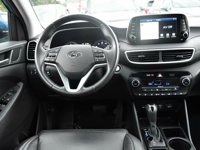 Синий Хендай Туксон, объемом двигателя 2.4 л и пробегом 23 тыс. км за 11000 $, фото 9 на Automoto.ua