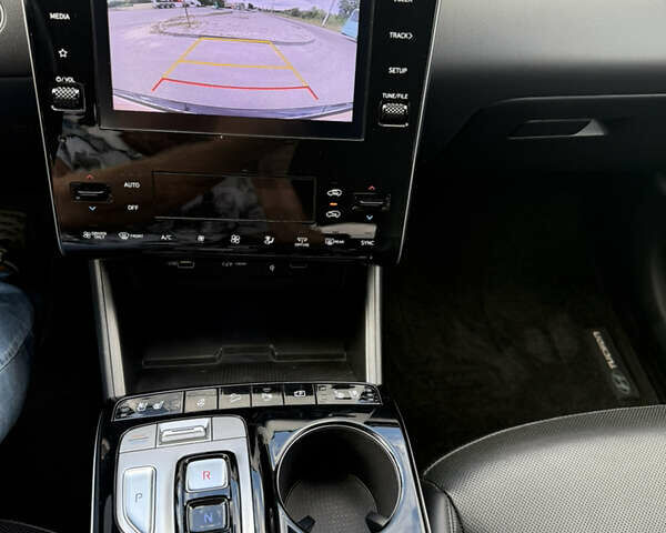 Синий Хендай Туксон, объемом двигателя 1.6 л и пробегом 30 тыс. км за 31300 $, фото 21 на Automoto.ua