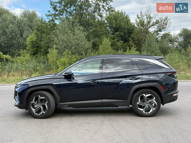 Синий Хендай Туксон, объемом двигателя 1.6 л и пробегом 30 тыс. км за 31300 $, фото 3 на Automoto.ua