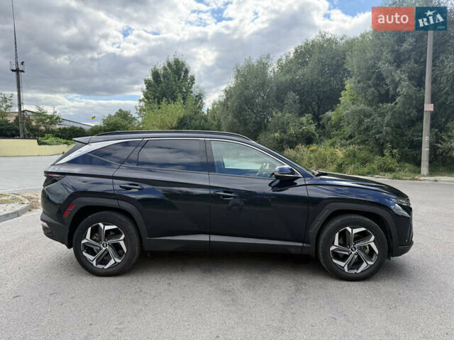 Синий Хендай Туксон, объемом двигателя 1.6 л и пробегом 30 тыс. км за 31300 $, фото 4 на Automoto.ua