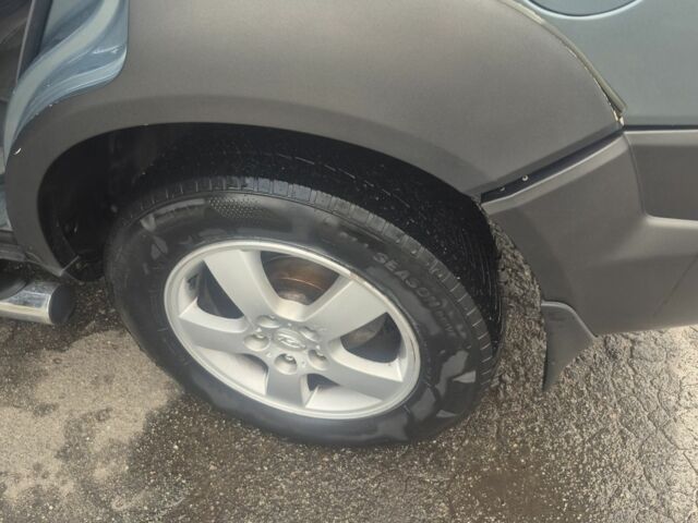 Зеленый Хендай Туксон, объемом двигателя 2 л и пробегом 190 тыс. км за 5000 $, фото 11 на Automoto.ua