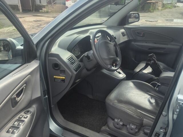 Зеленый Хендай Туксон, объемом двигателя 2 л и пробегом 190 тыс. км за 5000 $, фото 9 на Automoto.ua