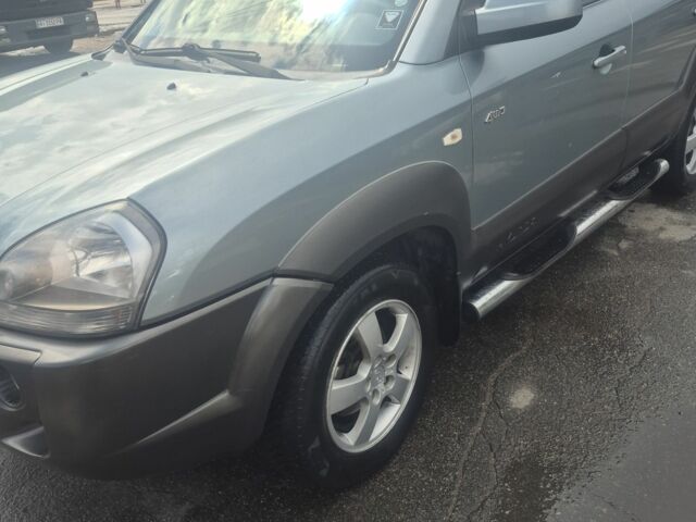 Зеленый Хендай Туксон, объемом двигателя 2 л и пробегом 190 тыс. км за 5000 $, фото 5 на Automoto.ua