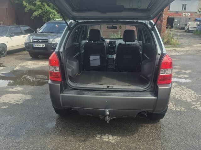 Зеленый Хендай Туксон, объемом двигателя 2 л и пробегом 190 тыс. км за 5000 $, фото 3 на Automoto.ua