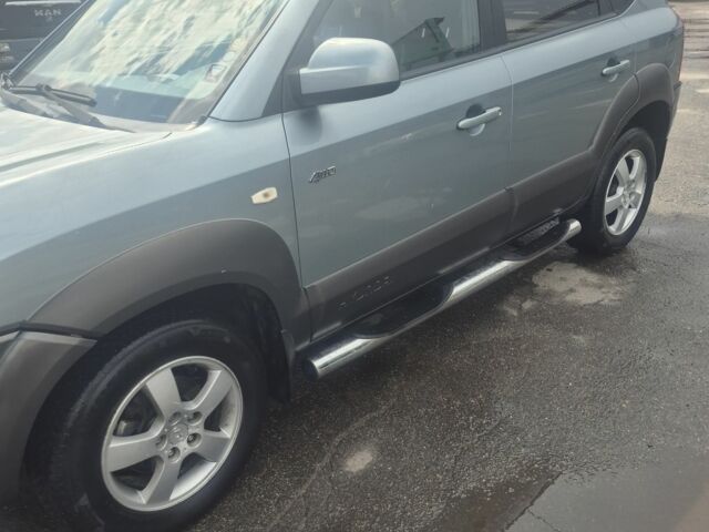 Зеленый Хендай Туксон, объемом двигателя 2 л и пробегом 190 тыс. км за 5000 $, фото 6 на Automoto.ua