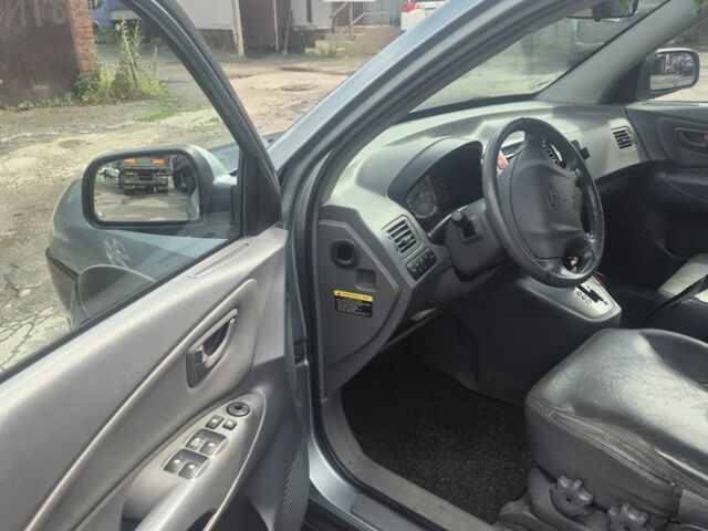 Зеленый Хендай Туксон, объемом двигателя 2 л и пробегом 190 тыс. км за 5000 $, фото 7 на Automoto.ua