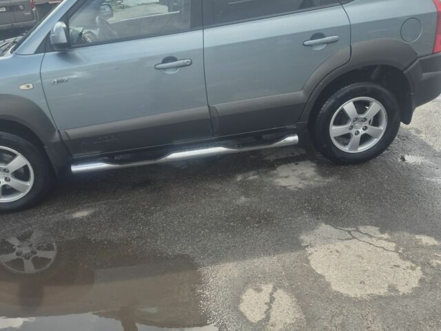 Зеленый Хендай Туксон, объемом двигателя 2 л и пробегом 190 тыс. км за 5000 $, фото 8 на Automoto.ua