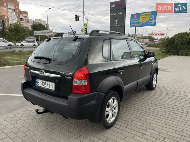 Зелений Хендай Туксон, об'ємом двигуна 2 л та пробігом 241 тис. км за 6999 $, фото 8 на Automoto.ua