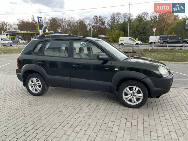 Зелений Хендай Туксон, об'ємом двигуна 2 л та пробігом 241 тис. км за 6999 $, фото 6 на Automoto.ua