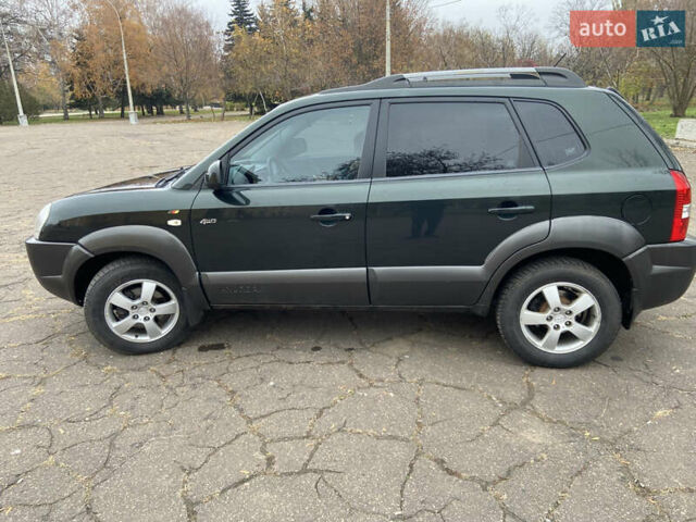 Зеленый Хендай Туксон, объемом двигателя 1.98 л и пробегом 200 тыс. км за 8500 $, фото 8 на Automoto.ua