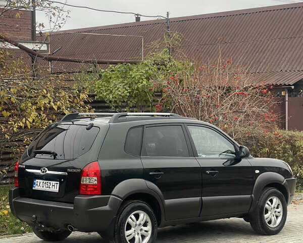 Зеленый Хендай Туксон, объемом двигателя 1.98 л и пробегом 261 тыс. км за 7499 $, фото 45 на Automoto.ua