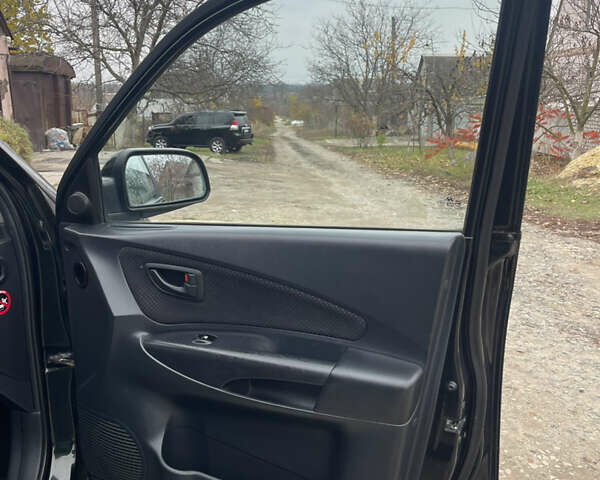 Зеленый Хендай Туксон, объемом двигателя 1.98 л и пробегом 261 тыс. км за 7499 $, фото 135 на Automoto.ua