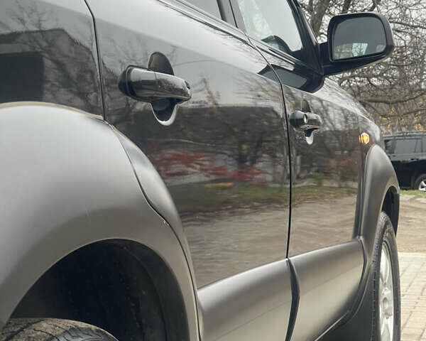 Зеленый Хендай Туксон, объемом двигателя 1.98 л и пробегом 261 тыс. км за 7499 $, фото 29 на Automoto.ua