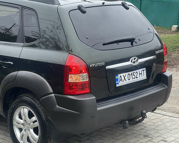 Зеленый Хендай Туксон, объемом двигателя 1.98 л и пробегом 261 тыс. км за 7499 $, фото 27 на Automoto.ua