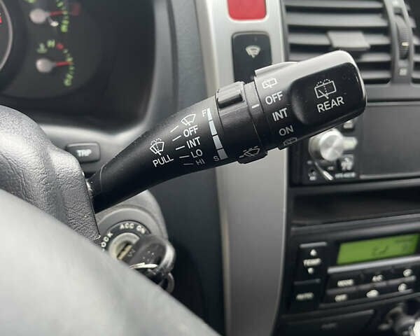 Зеленый Хендай Туксон, объемом двигателя 1.98 л и пробегом 261 тыс. км за 7499 $, фото 107 на Automoto.ua